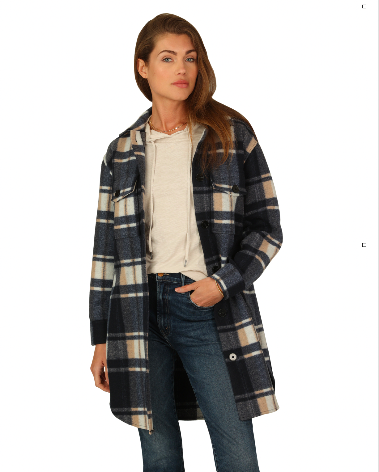 Model wearing Dylan Plaid Claire overcoat in midnight blue wearing jeans on a white background