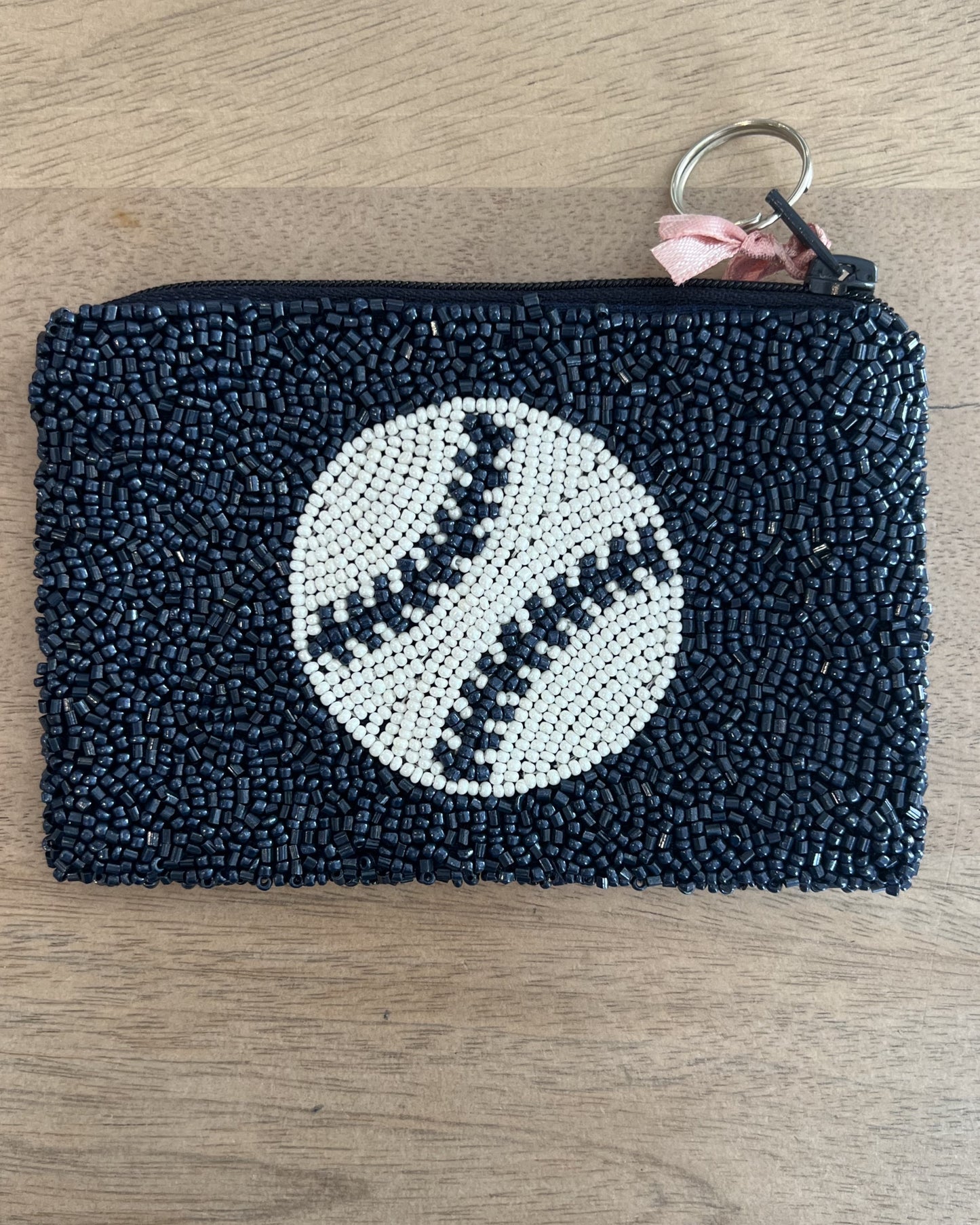 Image of Middlebury College Baseball Coin Purse Navy/White on a brown background