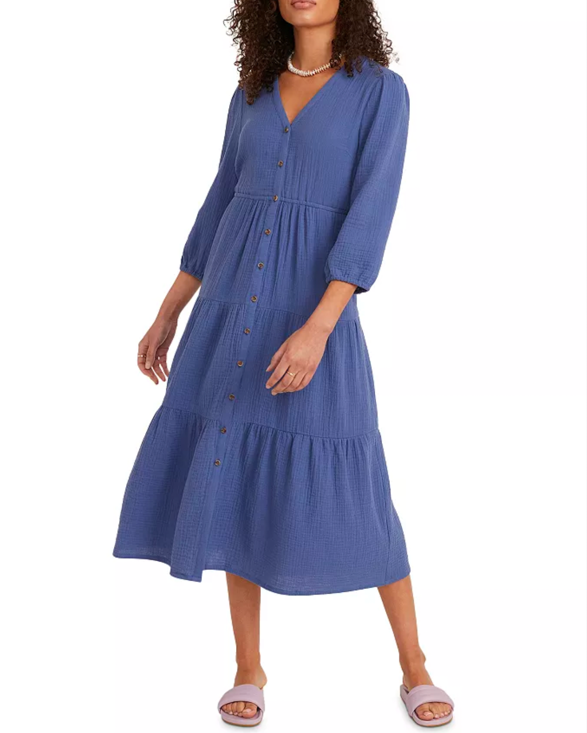 Model wearing Marine Layer Willow Doublecloth Midi Dress in Marine color standing behind a white background