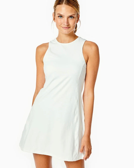 Model wearing Addison Bay Panama Dress in white on a white background