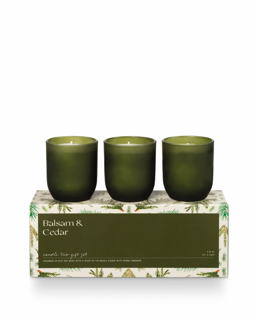Image of ILLUME Balsam & Cedar Candle Trio Gift set on a white background