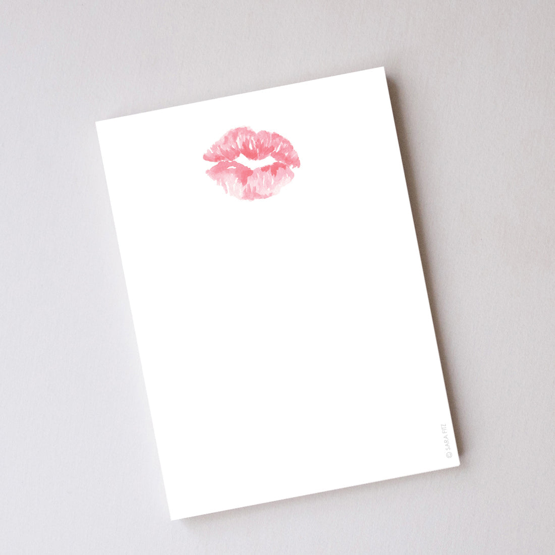 Image of Kiss Notepad on a white background