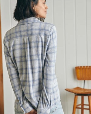 Model wearing Faherty Legand Sweater Shirt spring dew plaid on a white background