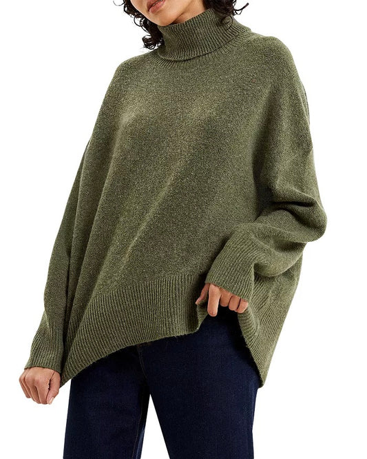 Model wearing French Connection Vhari High Neck Jumper olive night wearing jeans on a white background