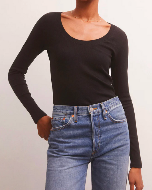 Model wearing Z Supply Sirene Rib Longsleeve Tee in black wearing jeans on a white background