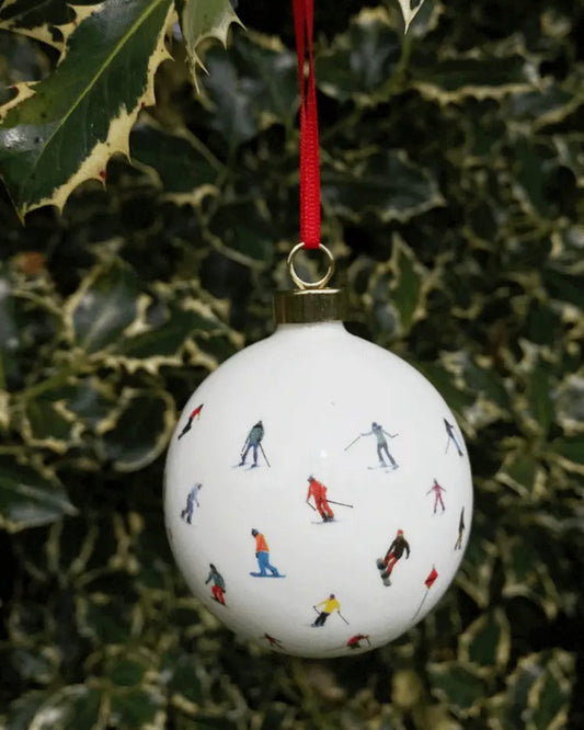 Image of Powerhound Christmas Bauble-Maker ski ornament hanging on a tree