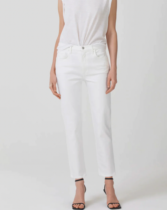 Model wearing Citizen of humanity white straight crop,wildflower  jeans wearing black sandals and a white top on a white background