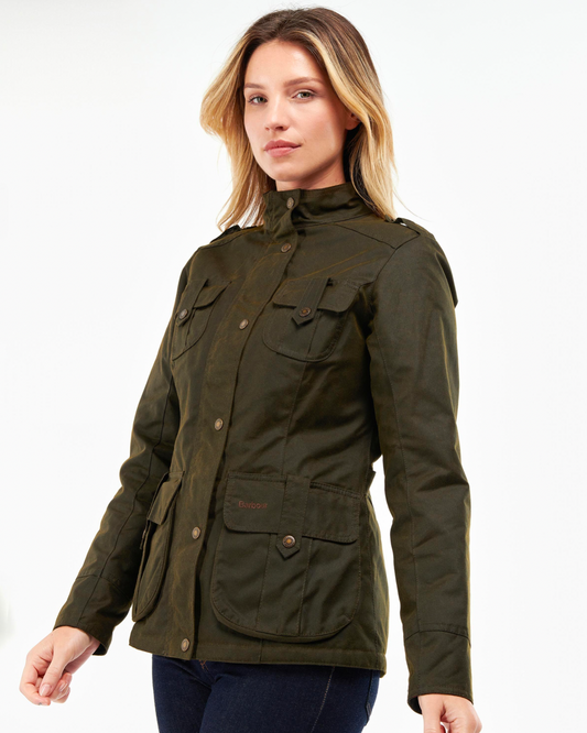 Model Wearing Barbour Winter Defence Olive Wax Jacket wearing jeans on a white background